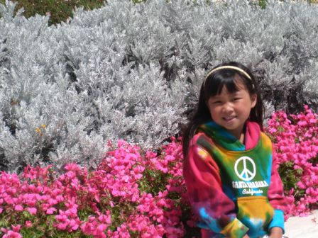 Kasen posing with pretty flowers